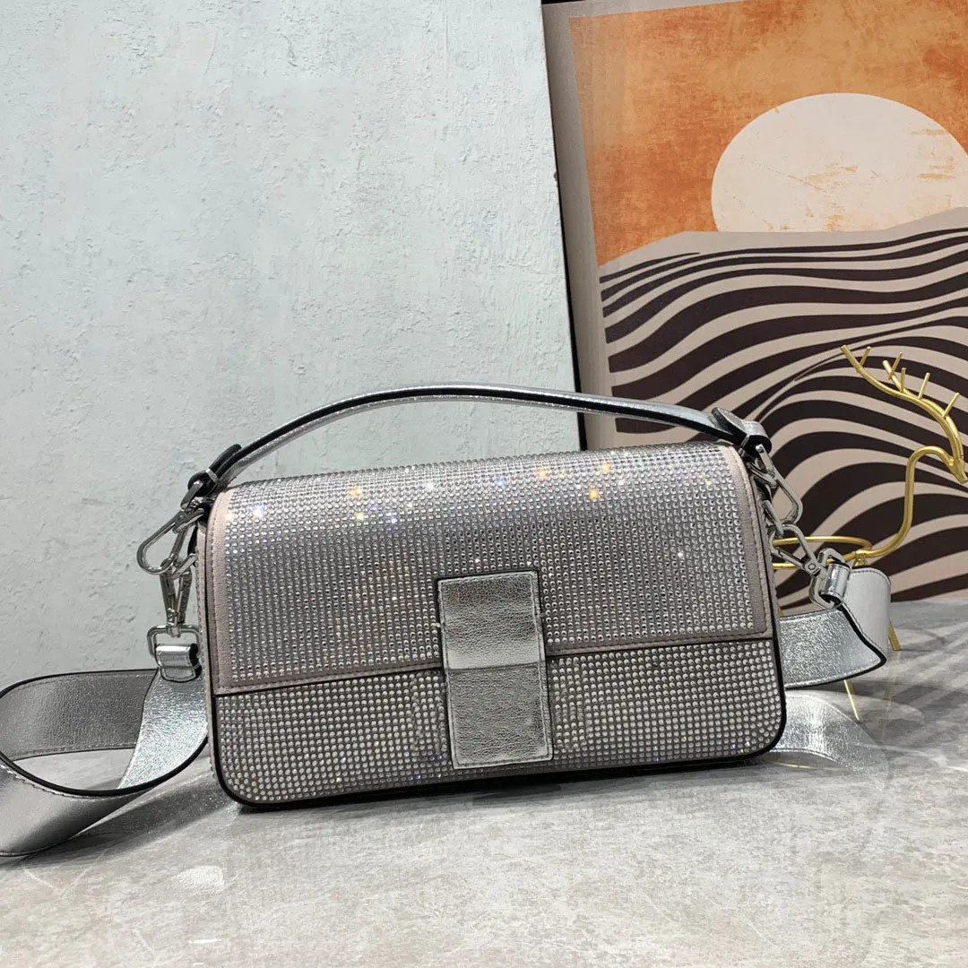 Stylish leather shoulder bag with chain top handle and a collapsible top design paired with a det... | DHGate