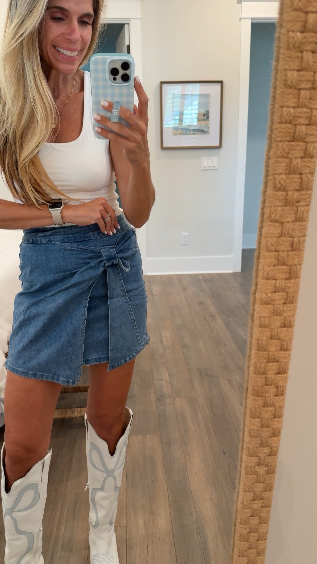 Country concert outfit, bow denim skirt, white tank, bow boots 

#LTKSeasonal #LTKFestival