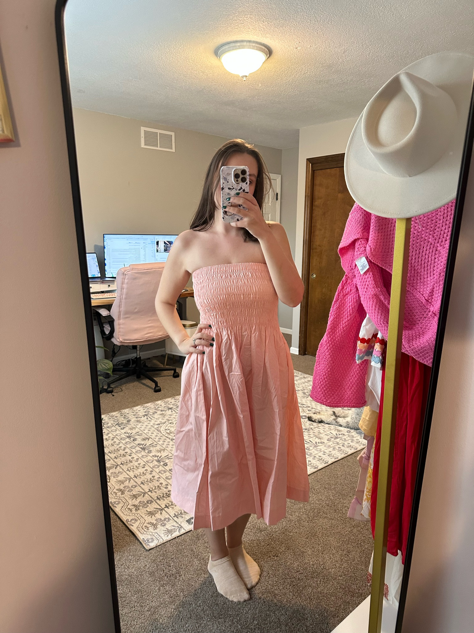 Pink smocked midi dress that converts into a maxi skirt as well! So cute for spring 💕

#LTKstyletip #LTKSeasonal #LTKFind