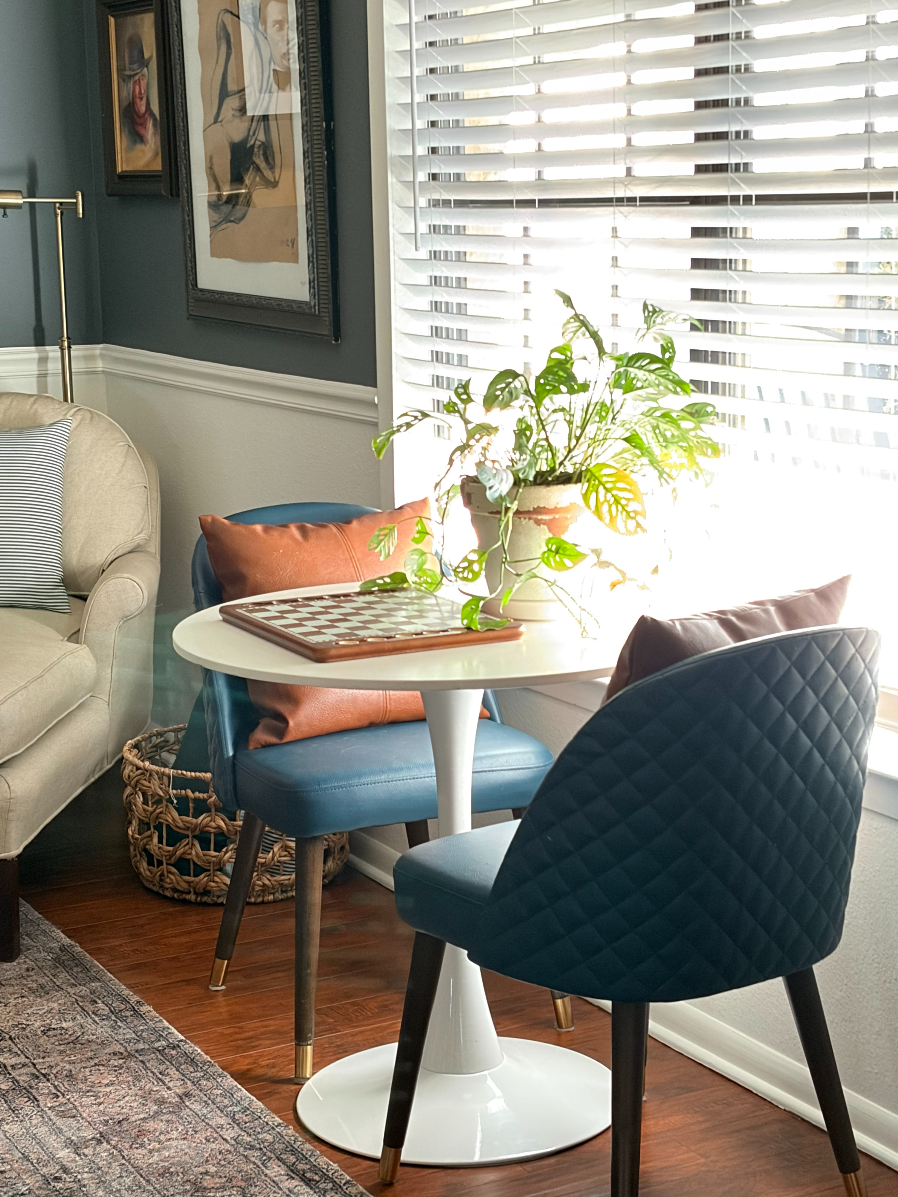 Create a cozy space in your home with this white tulip table and blue leather chairs.
#homerefresh#smalltable 

 #LTKHome #LTKSaleAlert