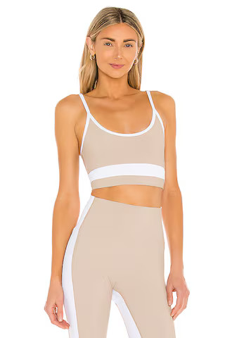 BEACH RIOT Eva Sports Bra in Taupe & White from Revolve.com | Revolve Clothing (Global)