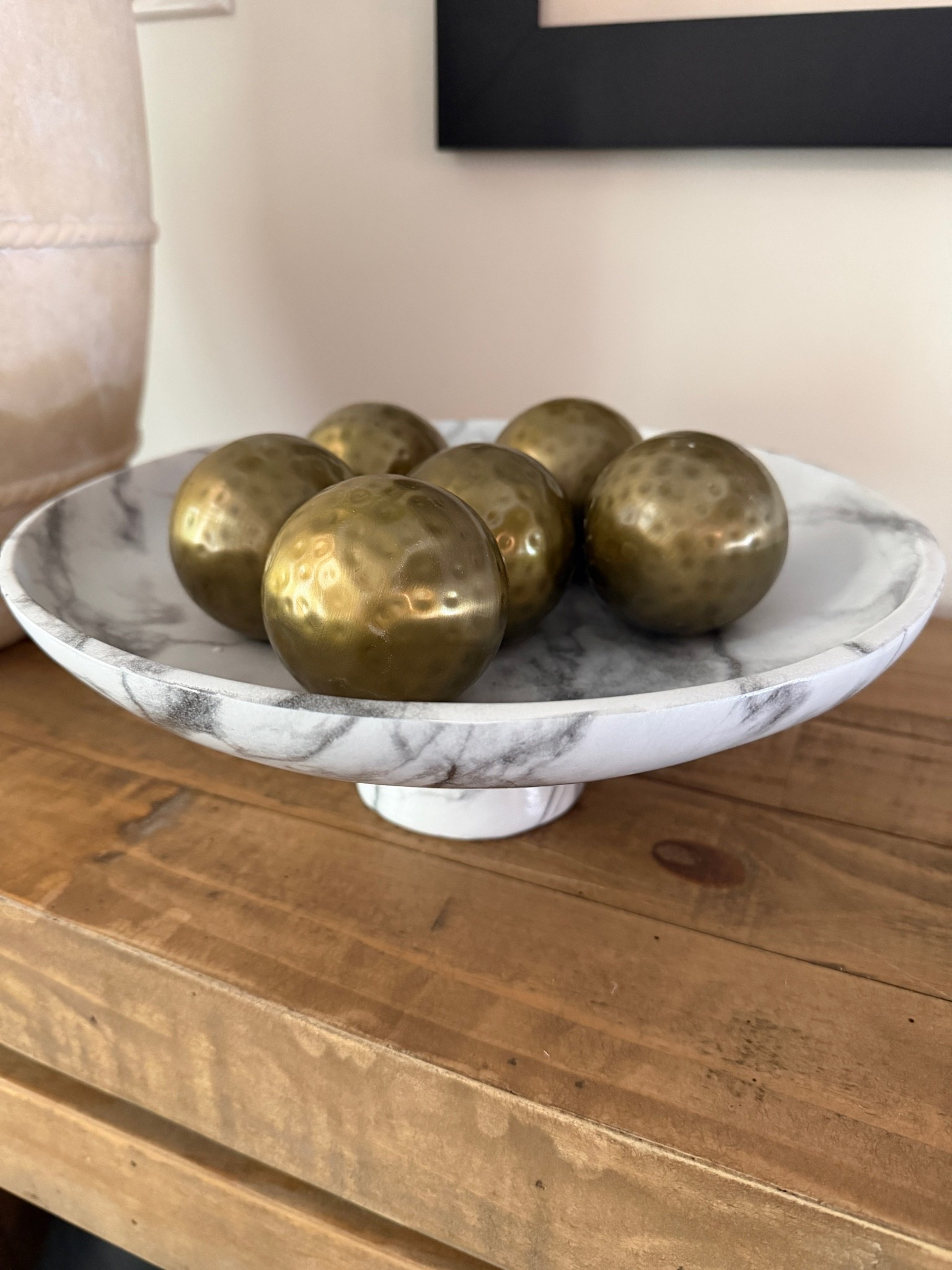 Some pieces just have that timeless feel…and this is definitely one of them. The marbling is absolutely beautiful and gives it such an elegant, collected look. I added a few brass orbs as filler for a little warmth and texture. This is one of those decor pieces you’ll keep and style for years to come
