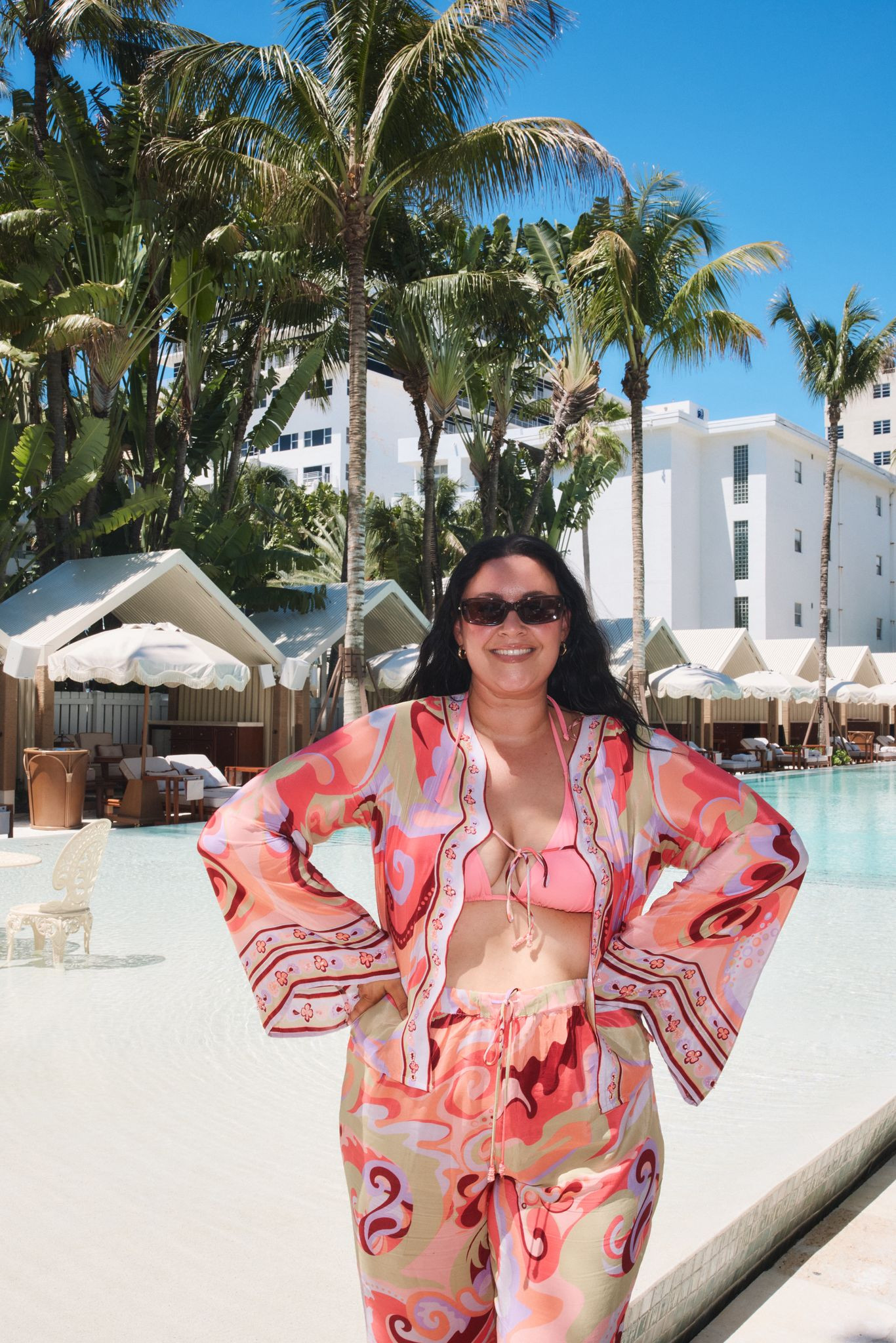 tropical vacation, poolside outfit, resort wear, vacation style, beach resort, palm trees, sunny getaway, pink bikini, printed cover up, matching set, wide leg pants, statement sleeves, colorful print, swimwear look, summer fashion, sunglasses, pool day, beach club style, travel outfit, warm weather style 

 #LTKsummer #LTKeurope #LTKtravel