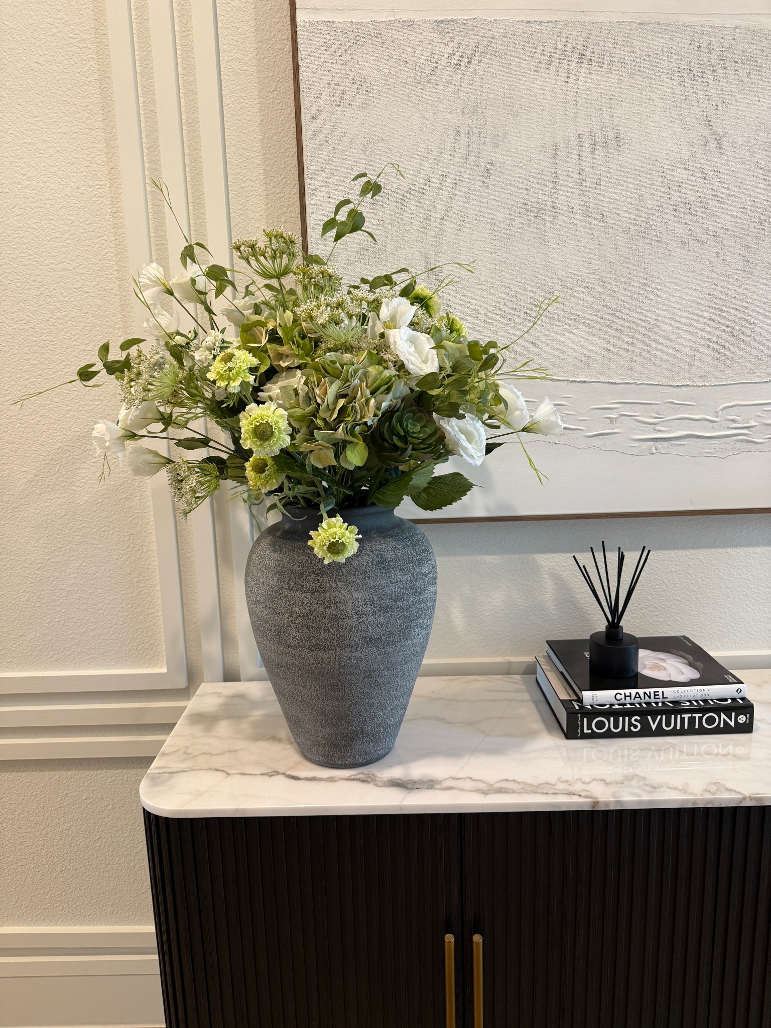 Spring Refresh Vibes
Loving how this corner came together! I added a touch of spring with this stunning vase + faux floral combo from Crate & Barrel—it’s giving effortless elegance. Paired with a few chic coffee table books, a moody sculpture, and my favorite reed diffuser for a complete luxe look.

Everything feels fresh, minimal, and elevated—perfect for spring!

#LTKhome #springrefresh #homedecor #entrywaygoals #crateandbarrel #neutraldecor

#LTKHome #LTKSeasonal #LTKFindsUnder100