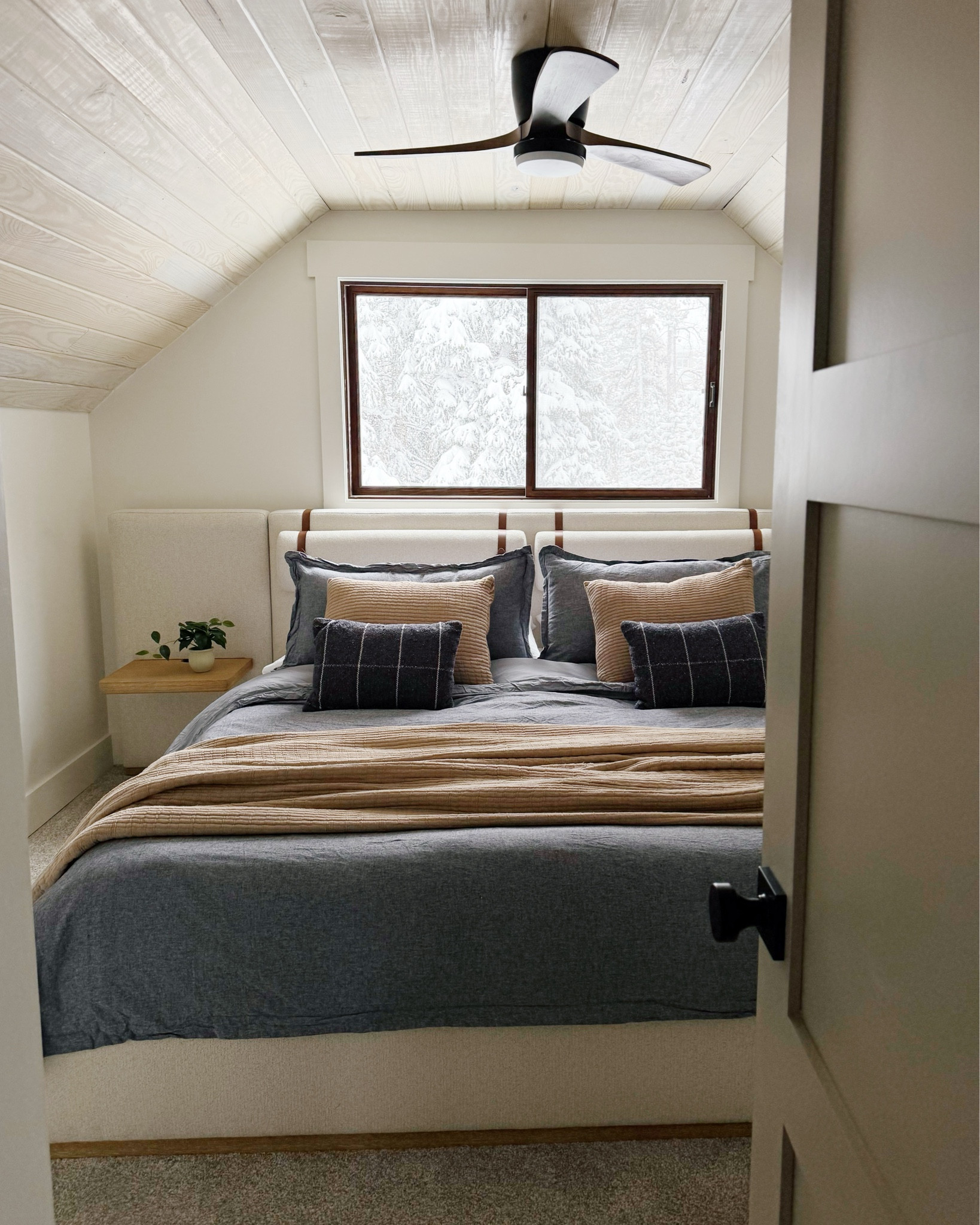 Layered to perfection. This bedroom is all about mixing textures and tones for a cozy, lived-in feel. The washed linen duvet brings that relaxed luxury, while the grid-patterned lumbar pillows and ribbed throw add just the right amount of structure and warmth. Earthy neutrals paired with soft chambray give it a grounded, modern cabin vibe. Everything is plush, breathable, and made for slow mornings with a view like that. Linking all the bedding pieces and lookalikes! #ltkhome #beddinginspo #layeredbedlook #cozybedroom #moderncabinstyle


#LTKHome #LTKSeasonal #LTKFindsUnder100