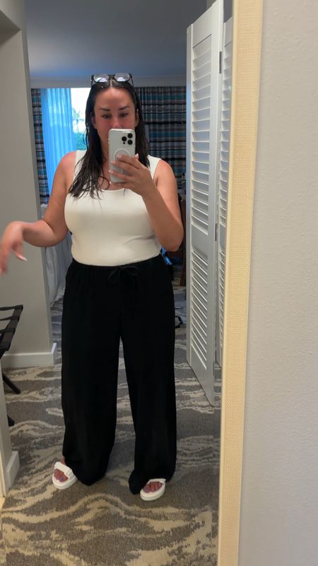 I'm about to walk to dinner and this is what I'm wearing super comfortable. This is just a thin amazon tank top, loose flowy pants, and these sandals, they've been so trendy so I tried them. They have arch support and they're comfy.
#affordablestyle #amazonfinds #midsizefashion

#LTKstyletip #LTKVideo #LTKSeasonal