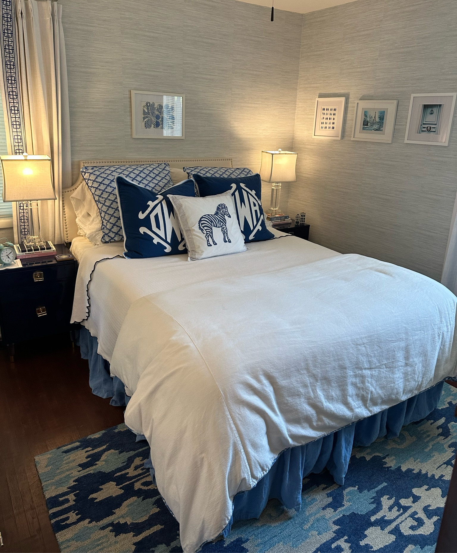 Over the summer I upgraded our guest bedroom’s walls from a yellow I did not love to this Amazon grasscloth wallpaper by society social! I opted for the color whisper blue and used about 11 rolls for a standard size room (with two windows and a closet with two doors). I’ve linked the wallpaper and the wallpaper application kit that made installation much smoother (quite literally)! 

#LTKFindsUnder50 #LTKHome