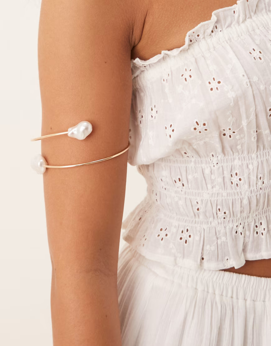 ASOS DESIGN wrap around arm cuff with molten faux pearls in gold tone | ASOS (Global)