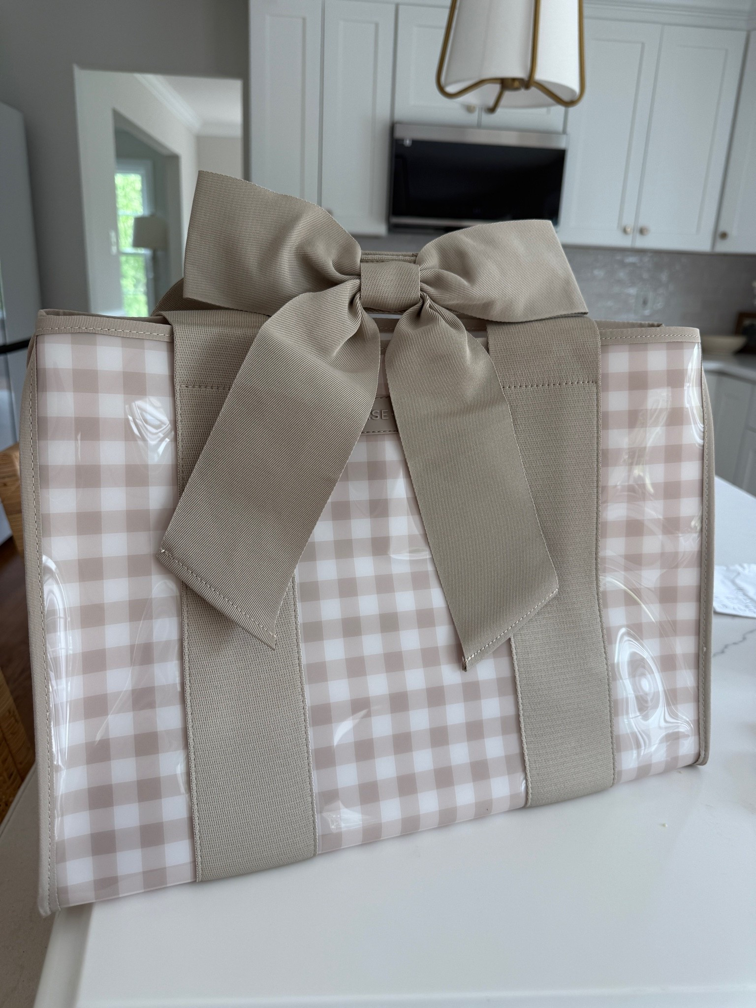 Cutest new bag with a bow strap!

#LTKSeasonal #LTKTravel #LTKMens