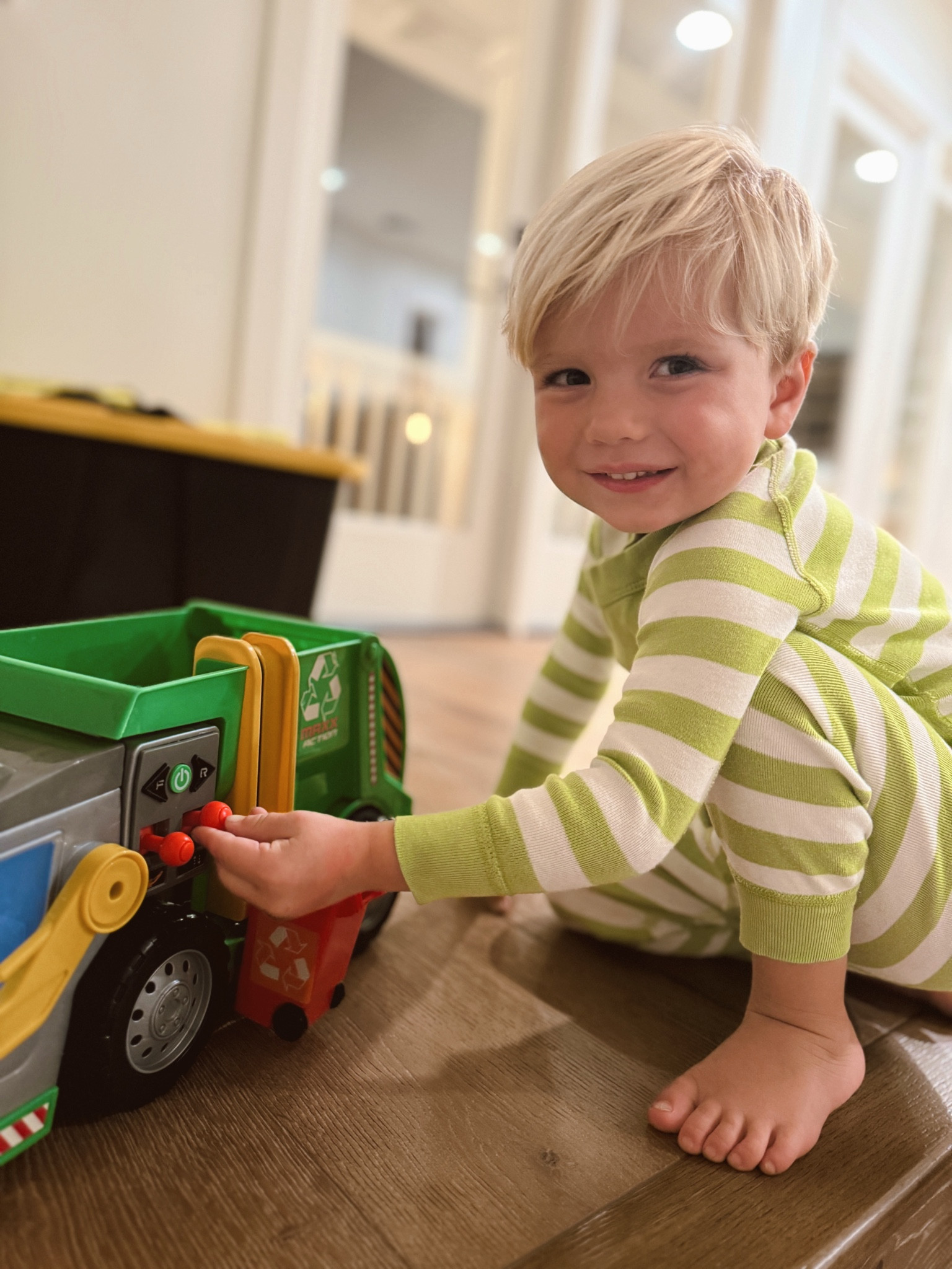 Cohen loves this trash truck toy  