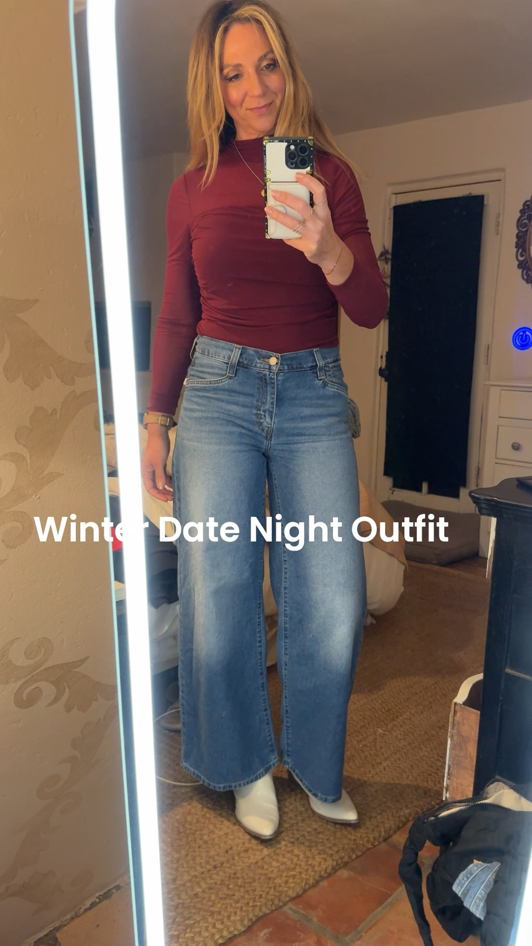Winter Date Night Outfit Idea 🤎✨

If you’re looking for the perfect winter date night outfit that feels cozy but still elevated — this is it. I’m wearing a burgundy / maroon sheer mesh bodysuit from Amazon (size medium) and it is SO comfortable. It’s stretchy, double-lined in all the right places, and amazing for a long torso fit. The price is unreal for how flattering it is.

Paired it with my mid-rise @Levi's  wide leg jeans — obsessed with the subtle V-slanted waistband that cinches you in and gives that ultra-flattering waist definition. The wide leg silhouette balances the fitted top perfectly and makes this such an easy, confidence-boosting combo. The perfect winter denim! 💯

Finished the look with white chunky western ankle boots for a little modern edge. Think: cozy meets cool.

Perfect for:
• Winter date night
• Girls night out
• Casual chic dinner outfit
• Valentine’s Day look
• Holiday dinner outfit
• Elevated mom style

Everything is linked 🤍

#WinterDateNight #WinterOutfitIdeas #DateNightStyle #AmazonFashionFind #BurgundyTop #WideLegJeans #LevisStyle #MomStyle #ChicWinter #LTKStyle #CasualChic #ValentinesOutfit #GirlsNightLook #EffortlessStyle

#LTKgrwm #LTKOver40 #LTKootd