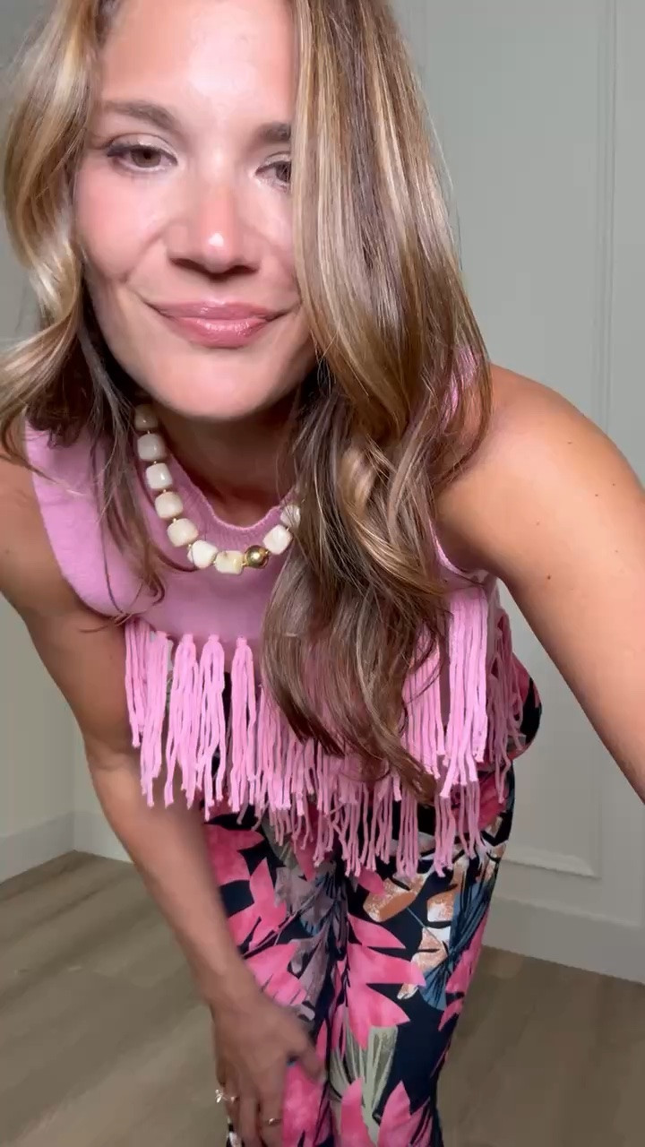 This fringe tank and tropical print pants make such a fun statement outfit for tall girls. The wide leg pants have the length I always look for at 6 feet, and the bold print paired with the fringe top is perfect for vacations, beach dinners, or summer nights out.

Tall girl outfits, Tall friendly clothing, Long inseam pants, Wide leg pants, Tropical print pants, Fringe tank, Vacation outfits, Resort wear, Summer outfits, Beach dinner outfit, 6 foot style, Amazon fashion, Stang and Co

#LTKSeasonal #LTKTall #LTKTravel
