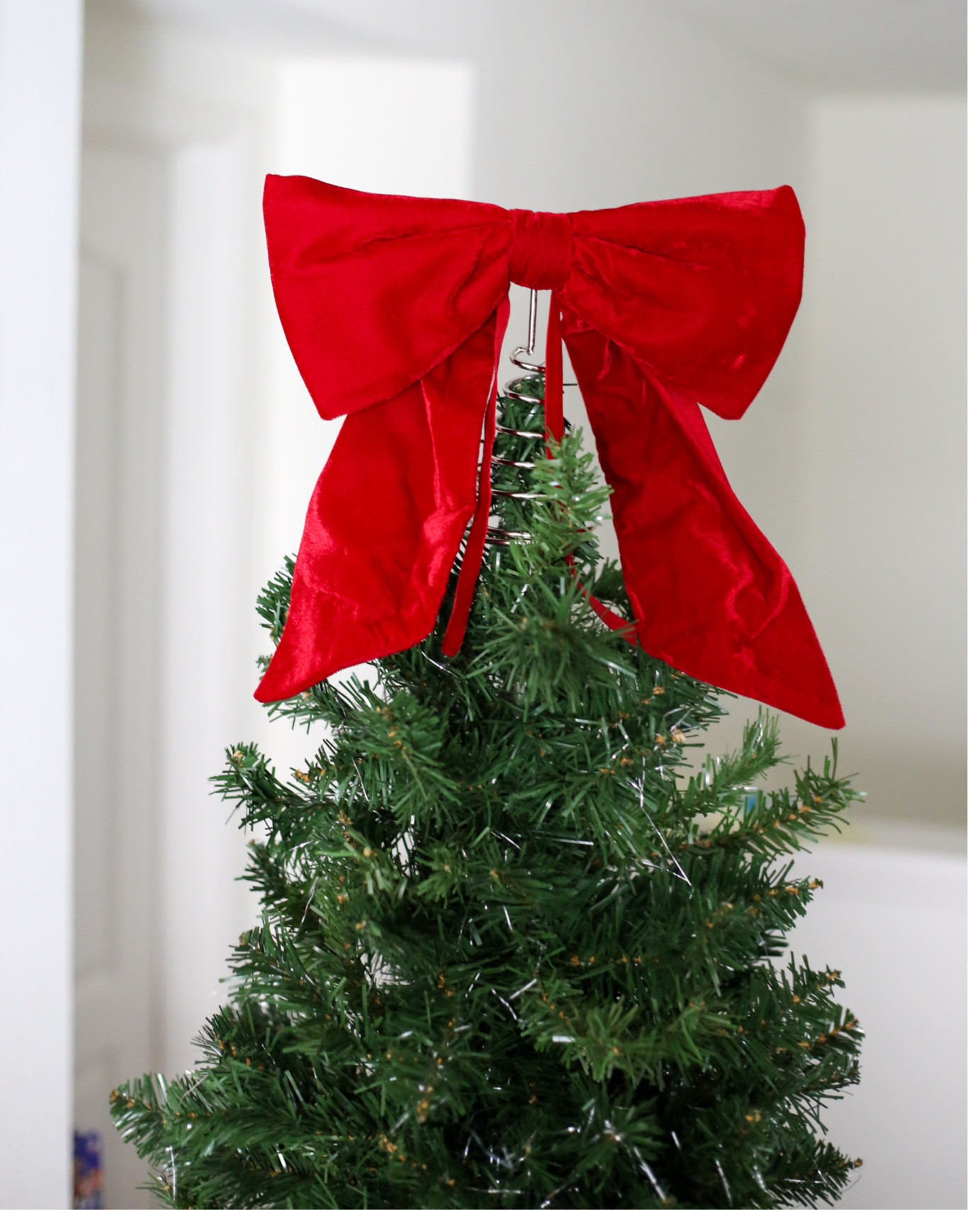 Red velvet bow Christmas tree topper  

#LTKHoliday #LTKHome