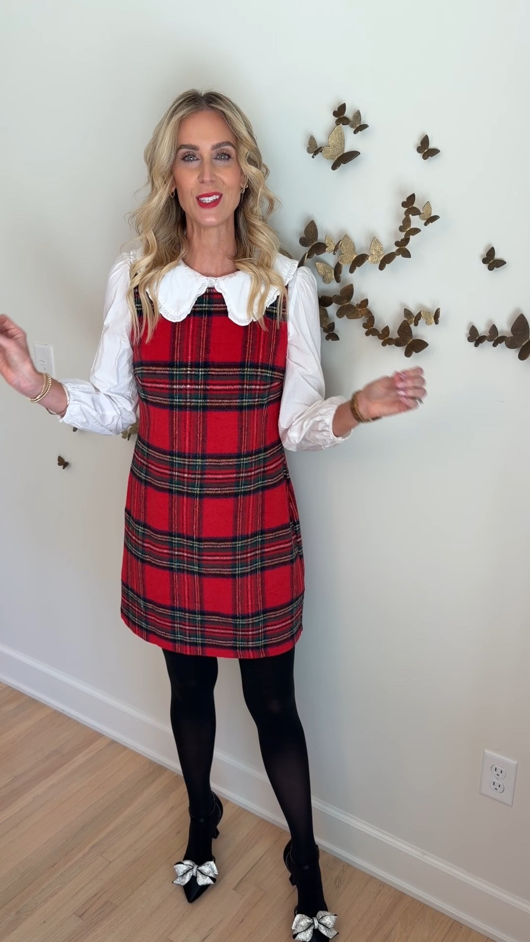 I absolutely love this Amazon plaid shift dress for a holiday party outfit idea! I paired it with tights and bow heels for a really fun holiday outfit!