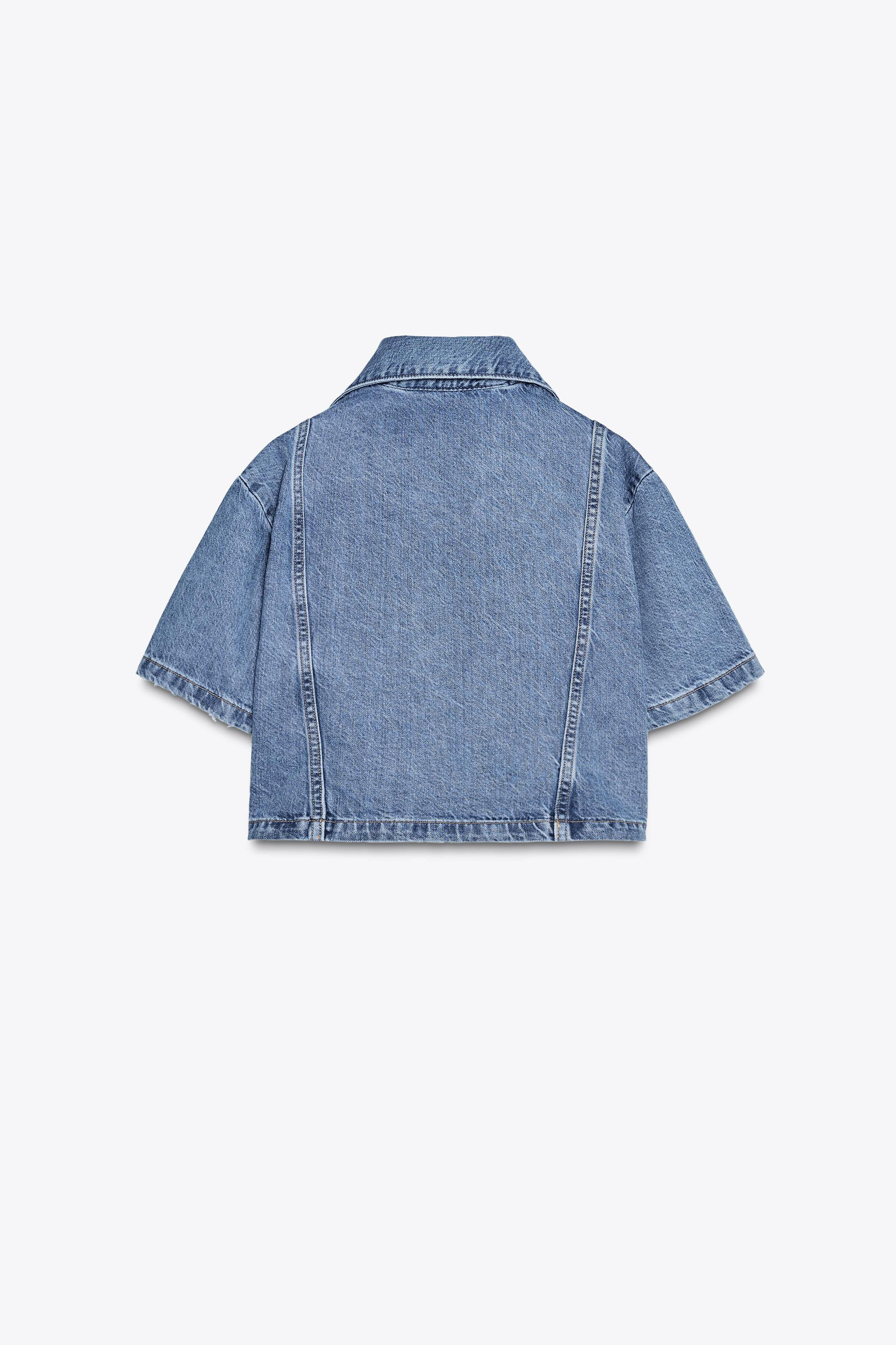 V-neck shirt with lapel collar and short cuffed sleeves. Front patch pockets. | Zara US