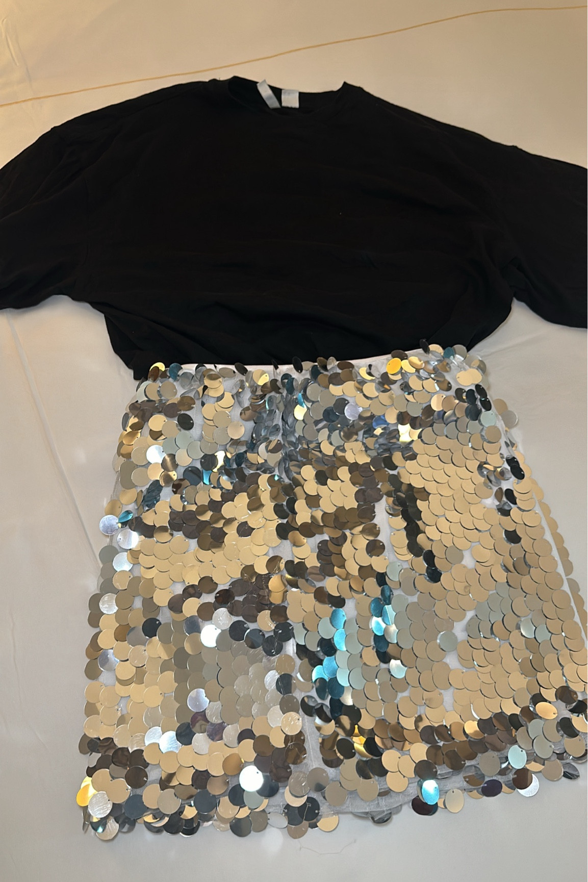Concert Outfit 🎵 🪩 

Concert, London o2, sequin skirt, sequins, 
Mid size fashion, mid size, silver skirt, oversized tshirt, oversized looked

#LTKsummer #LTKuk #LTKsale