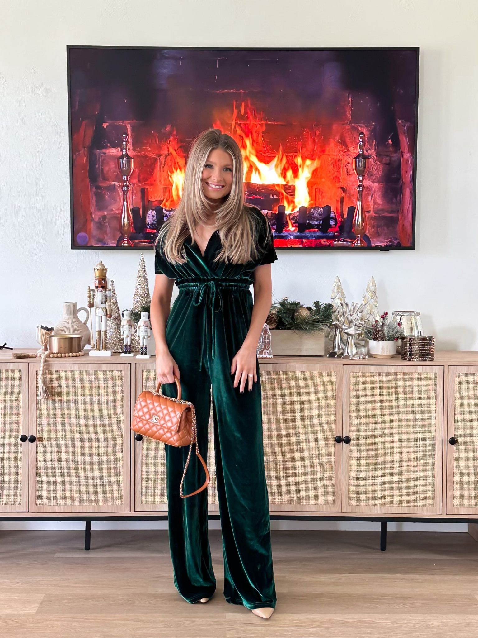 Christmas outfits for every occasion. Christmas party. Office party. Mom style. Mom fashion. Velvet jumpsuit. Green jumpsuit. Red satin top. Houndstooth skirt. Winter skirt. Winter wedding guest. Cream sweater. Pearl sweater. Black pants. Black leggings. Faux leather leggings. 

#LTKfindsunder100 #LTKHoliday #LTKstyletip