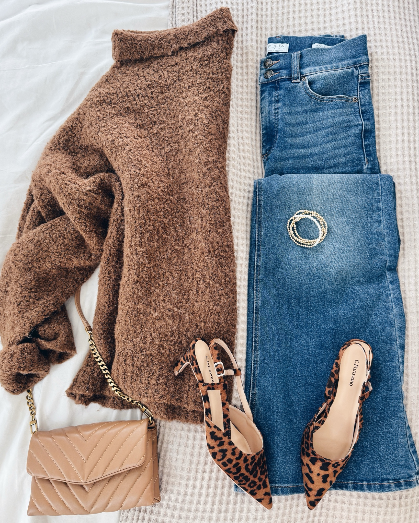 Linking a similar sweater and a save leopard shoe!  Jeans fit true to size.  Winter outfit.  



#LTKFindsUnder50 #LTKShoeCrush #LTKSaleAlert