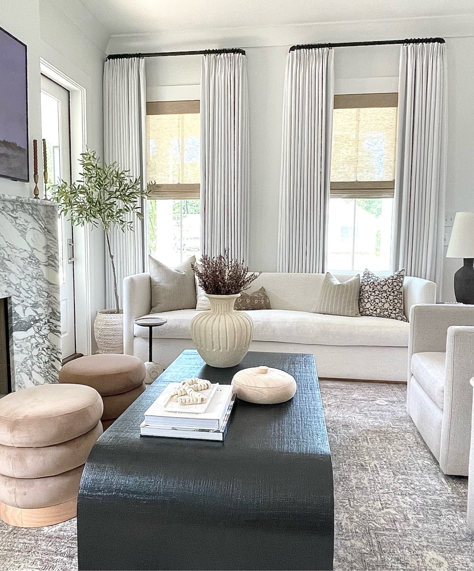 Home decor, Living room curtains, white linen curtains, TwoPages curtains, custom curtains, living room decor, black coffee table, round studio McGee ottomans, living room rug, cream sofa, white sofa, 

#LTKxPrimeDay #LTKFind #LTKhome