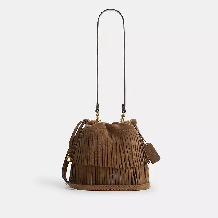 Faye Mini Drawstring BagWith Fringe$169(32% off)Comparable Value $250 | Coach (US)