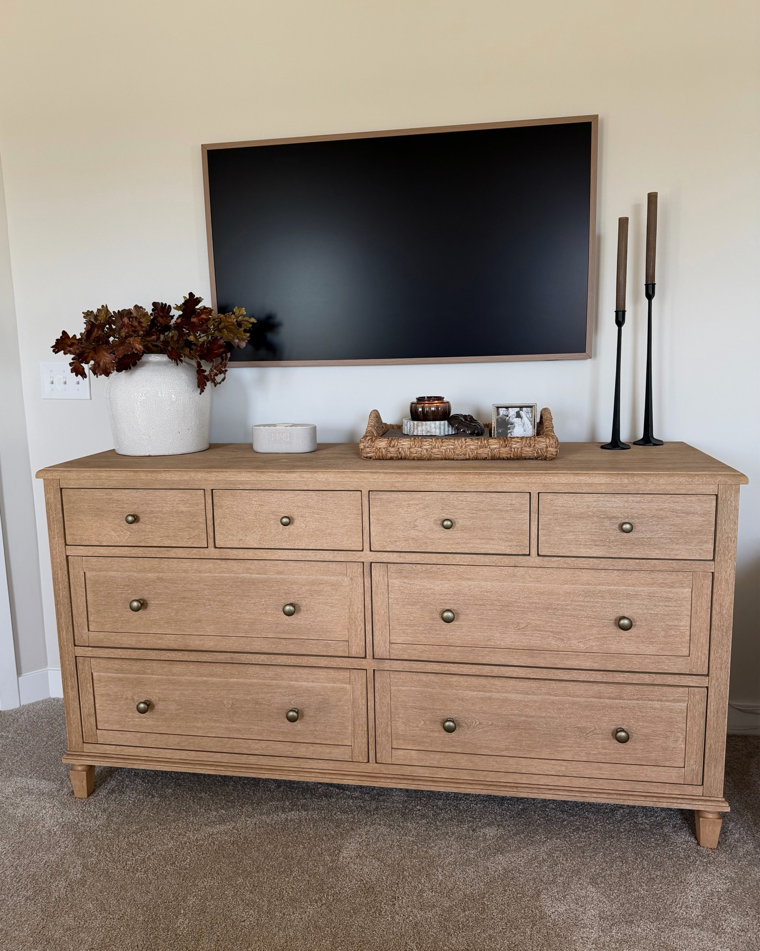 Sausalito dresser, Sam’s n frame tv, frame tv, oak stems, white vasa, candlesticks, iron tapers, brown candlesticks, neutral alarm clock, brown pumpkin candle, white chair, brown throw blanket, brown pillow cover

#LTKSeasonal #LTKHome #LTKSaleAlert