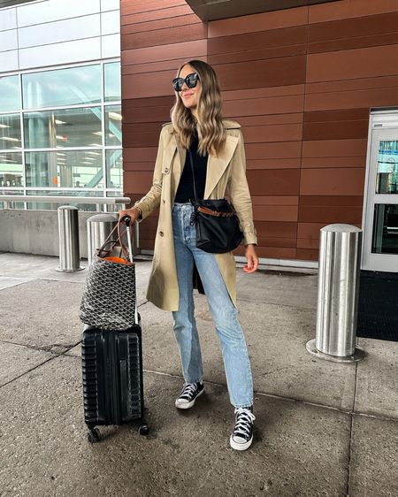 Fashion Jackson travel outfit. Trench coat (small), black top (small), AGOLDE jeans (tts), converse sneakers, goyard tote, Amazon luggage, travel outfit, jeans #fashionjackson #sneakers #traveloutfit #jeans #converse

#LTKtravel #LTKstyletip #LTKshoecrush