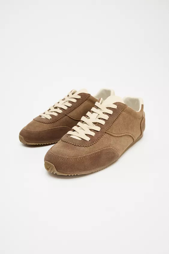Leather sneakers. Topstitching detail on the upper. Lug sole. Contrasting lining and back. Lace c... | Zara US