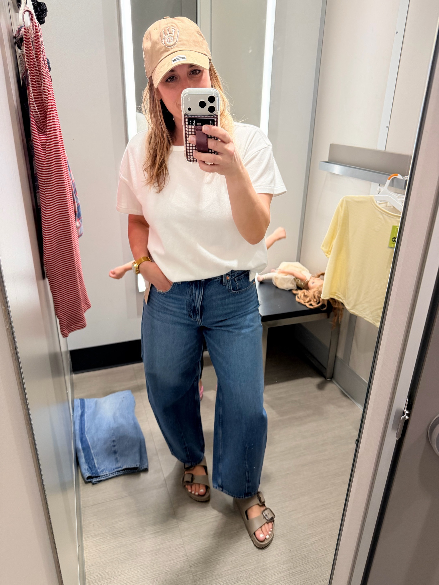 How cute is this casual Mom outfit from target? I’m 41 years old and this is exactly the style I love… high waisted barrel jeans, Birkenstocks, the perfect heavyweight white T-shirt, and a neutral ball cap… perfection! This is exactly how I would style barrel jeans. I’m 5 foot three. I’m wearing my typical size 8 I actually sized down two times in this T-shirt to an extra small cause I didn’t want it to be too oversized, but it’s still oversized enough to tuck. These sandals are worth the money. They are so comfortable and cute. Don’t keep out on the inexpensive ones. ￼



#LTKOver40 #LTKootd