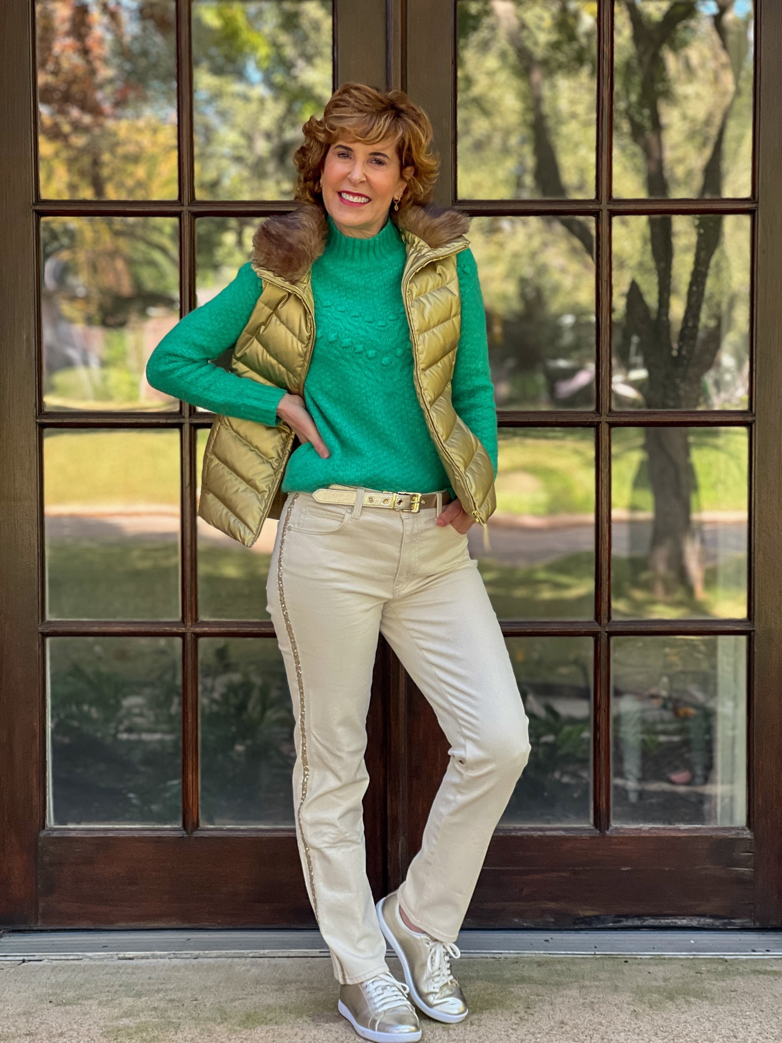 These straight leg jeans have the cutest gold sequin stripe down the side! I paired them with the softest Chevron knit mockneck sweater in jade and a fun metallic gold vest with a removable faux fur collar. I finished things off with a reversible gold belt (reverses to tartan) and gold matte sneakers that I can't seem to stop wearing!

#LTKSeasonal #LTKHoliday #LTKshoecrush