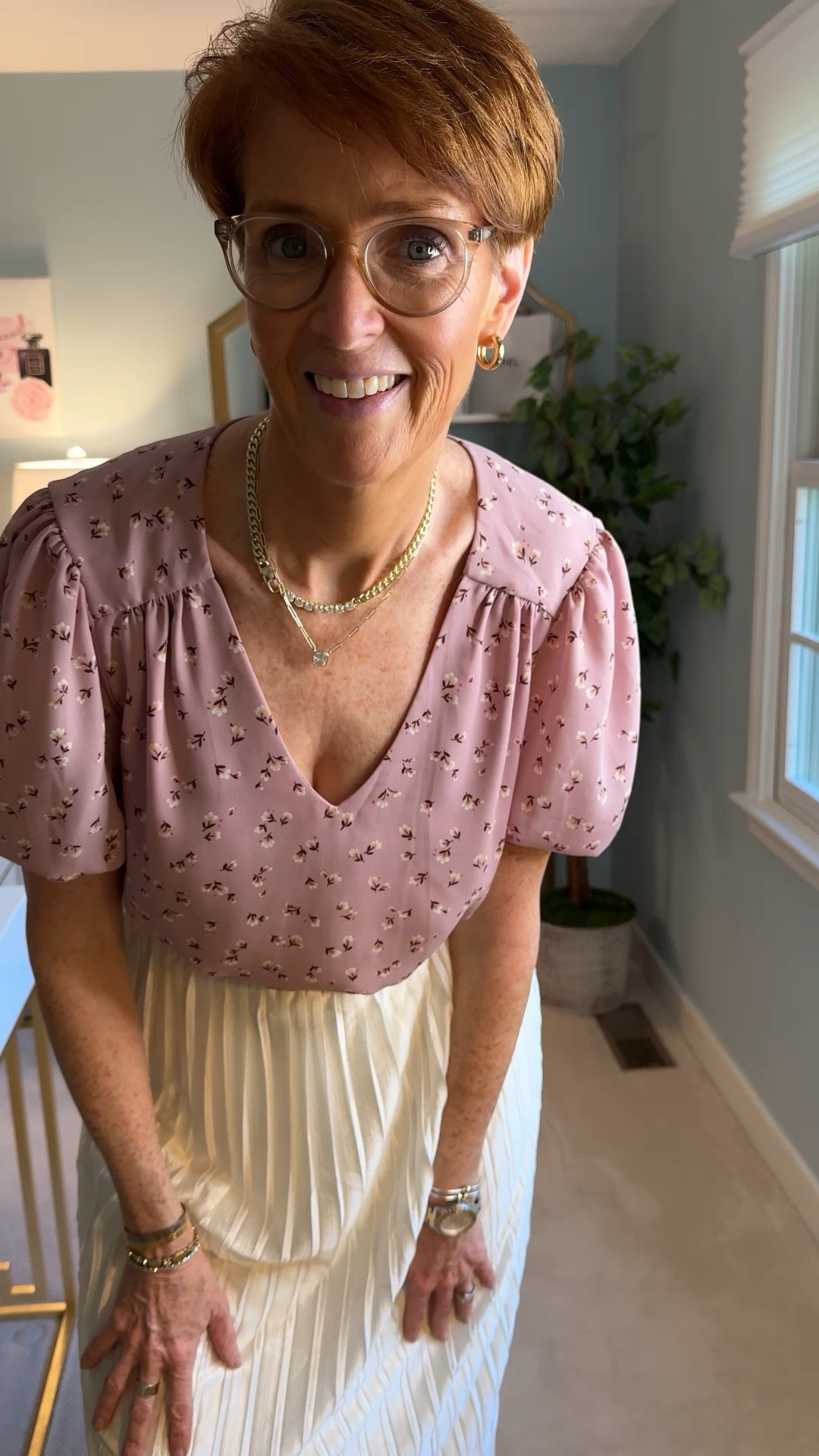 Cream in the winter and for the holidays is a classic

* Pale Mauve V-Neck Short Sleeve Floral Blouse: Feminine florals meet soft tones, ideal for layering under your favorite jackets.
* Cream Pleated Skirt: A classic pleated design that pairs perfectly with both casual and dressy looks.

#LTKStyleTip #LTKHoliday #LTKOver40