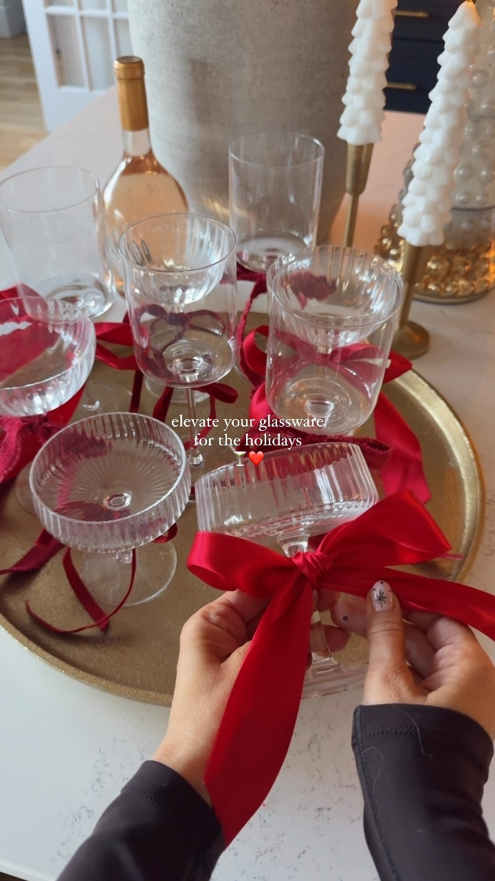 hostess with the mostest 🍸| grab ribbon in various sizes + types (satin + velvet works so well together) and tie bows to your glassware, a super easy way to elevate your party this holiday season 🎀✨

save for holiday inspo ❤️
#christmasideas #christmasparty #partyideas #tistheseason #hostess #bowseason #partytips 

#LTKHome #LTKHoliday #LTKSeasonal