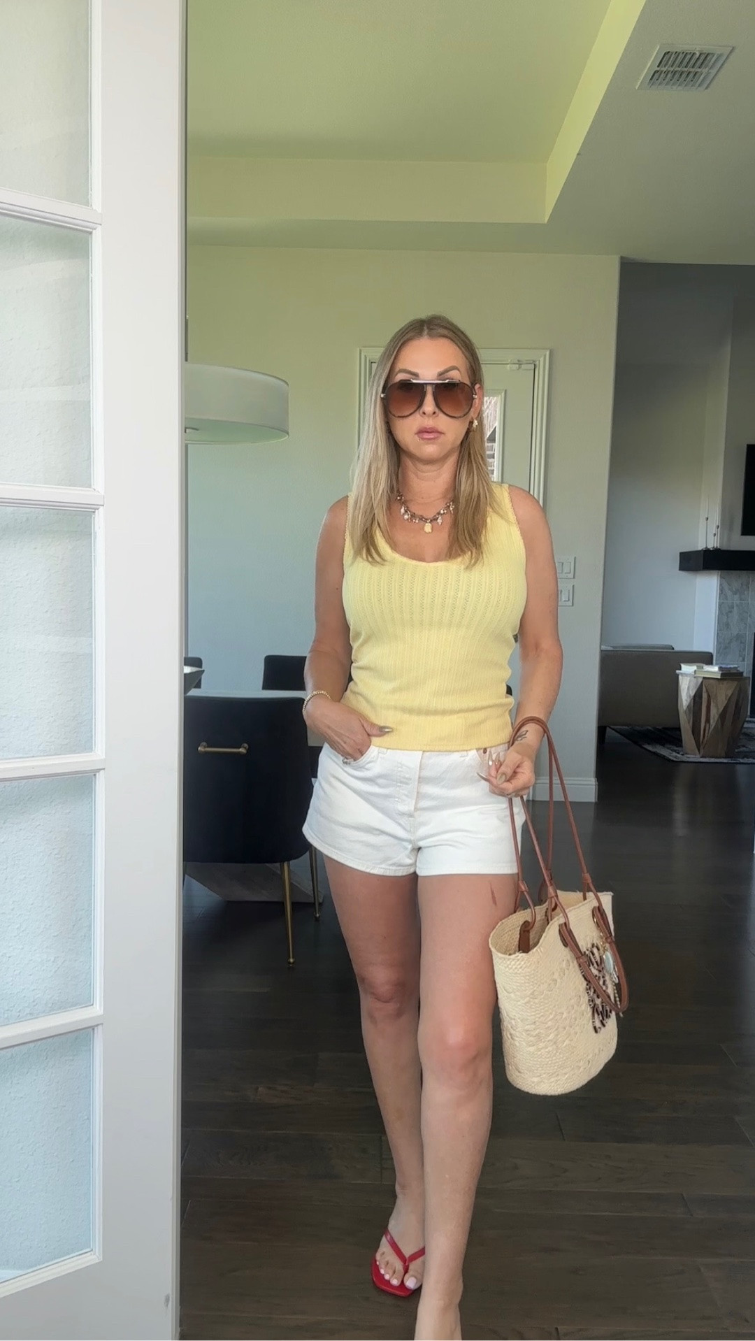 Wearing one of my favorite easy outfit formulas lately—simple pieces styled intentionally always wins. This look is a perfect example of over 40 style that feels polished without trying too hard. I love mixing high low style like this with a classic tank, crisp white shorts, and elevated accessories that pull everything together for real life outfits worn beautifully.

#over40style #highlowfashion #summerstyle #elevatedbasics #LTKstyle

#LTKgrwm #LTKootd #LTKSeasonal