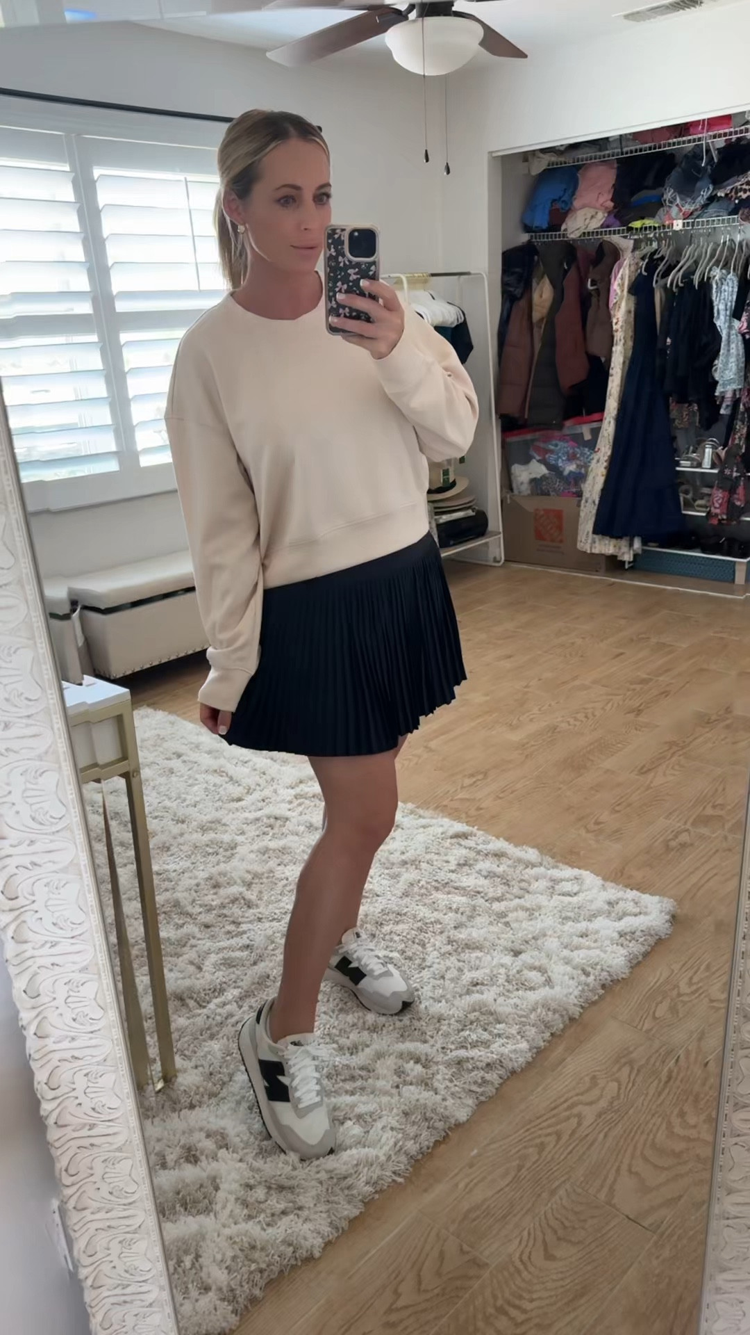 Activewear look. Pleated tennis skort. Cropped sweatshirt. New balance sneakers 

#LTKMidsize #LTKActive #LTKootd