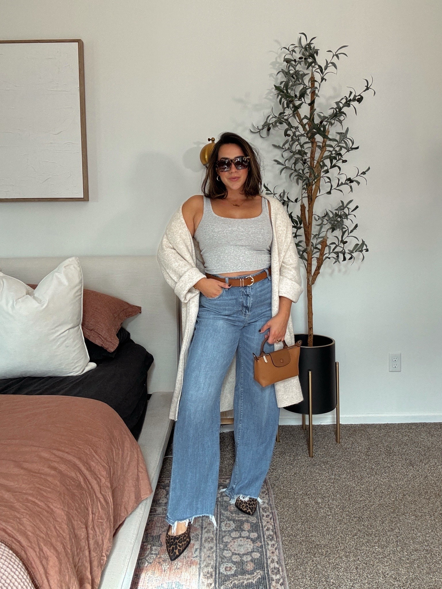 The top selling dreamy drape jeans styled! These are the best stretchy, soft jeans. Perfect Fall mom style outfit with cardigan, jeans and leopard print sandals. 

Fall denim, easy fall outfit, Winter jeans, winter outfit, American Eagle denim, winter outfit ideas

I do Size 8 jeans - they run very big I’m normally 8/10 but these I could do 6. Tank L, cardigan L. 

#LTKMidsize #LTKSeasonal #LTKStyleTip