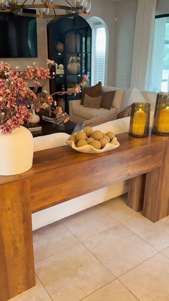 Comment TABLE and I’ll send you the link 💬 I can’t believe this price $169

 didn’t know what to do with the space behind my sofa… until I added this 😭
This console table made it look instantly styled and intentional without taking up too much space

I love it behind my couch, but it would look just as good in an entryway too 👀✨

#consoletable #behindsofa #entrywaydecor #livingroomideas #homestyling homeupgrade interiorstyling cozyhome neutraldecor entrywayinspo styledspace furniturefinds tiktokshophome decorinspo tiktokshopfinds