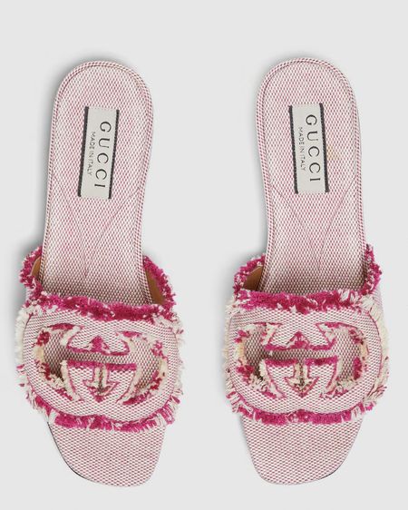 Gucci
WOMEN'S INTERLOCKING G SLIDE SANDAL

Taking inspiration from archival codes from the 1970s, hallmark era of the House, the Interlocking G appears as a frayed maxi-cut out detail atop this fuchsia canvas sandal

#LTKWorkwear #LTKStyleTip #LTKShoeCrush