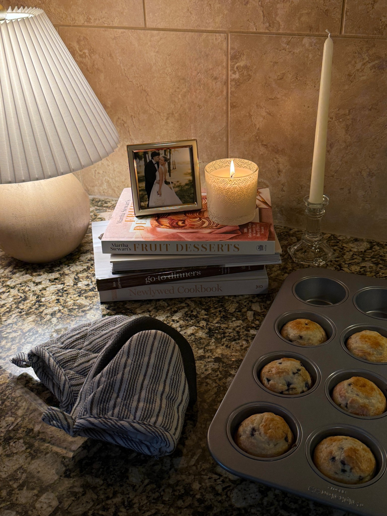 Calphalon muffin tin
Target Threshold candle
Martha Stewart’s Fruit Desserts Cookbook
Ina Garten’s Go-To Dinners Cookbook
Williams Sonoma’s Newlywed Cookbook 
Amazon candlesticks 
Thrifted candlestick holder (Linked similar option)
Hobby Lobby lamp (Linked similar)
Picture frame is Home Goods (Linked other options)

#LTKfoodie #LTKdayinmylife #LTKHome