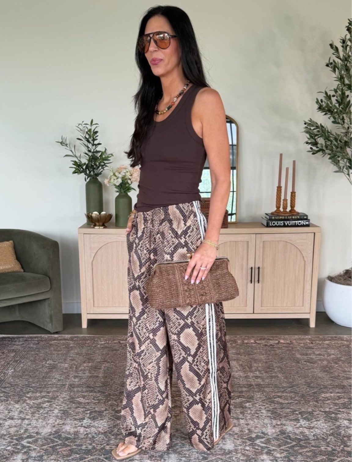 @adidas adidas  snakeskin pants - small 
@Aritzia  tanks- small 
@Target

Wearing a small top and bottom