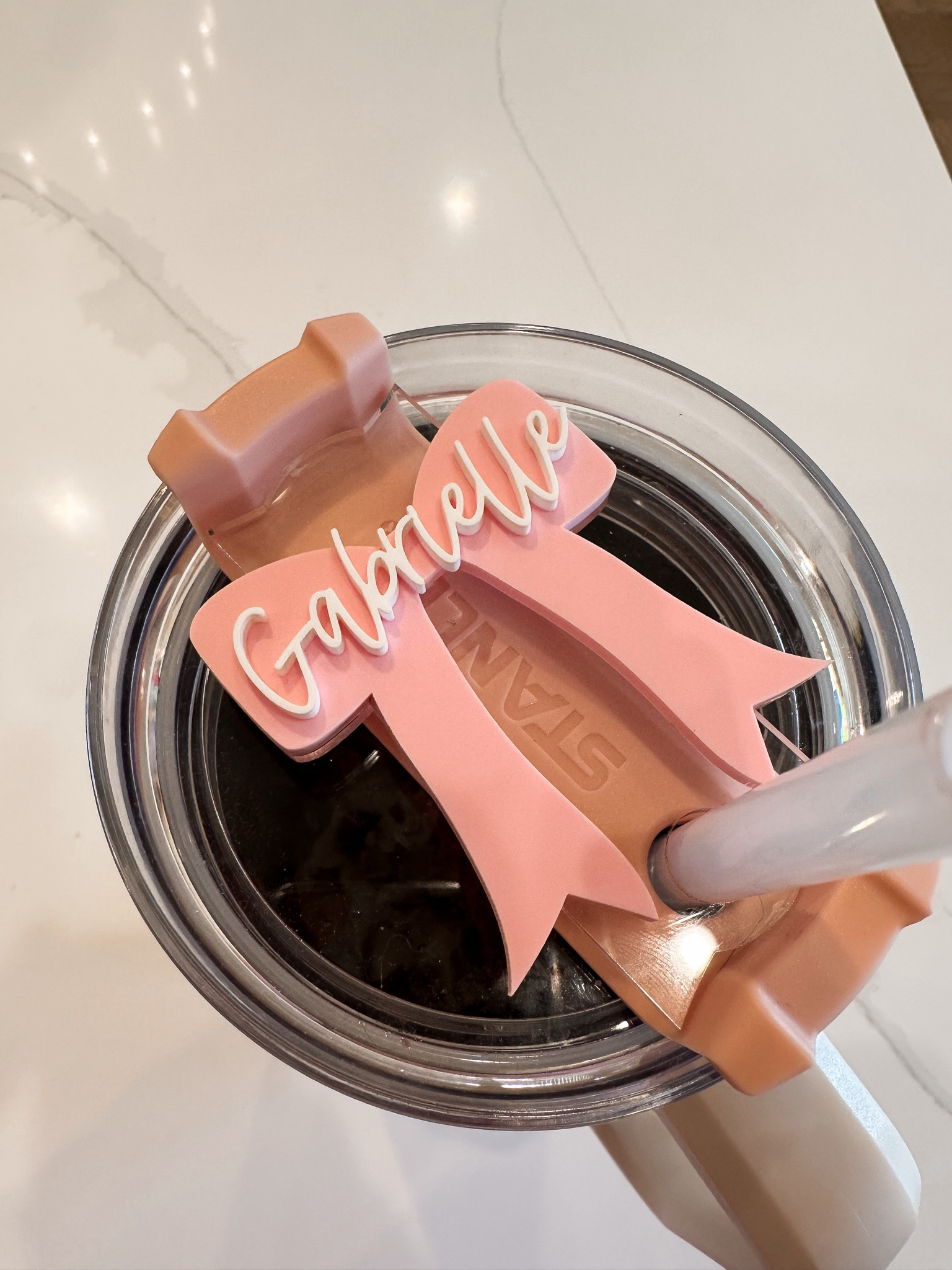 Didn’t think I could love my Stanley cup anymore but omg this acrylic name tag just took it to the next level! SO stinking cute🩷🎀 #stanley #stanleycup #acessories 

#LTKGiftGuide #LTKfindsunder50 #LTKhome