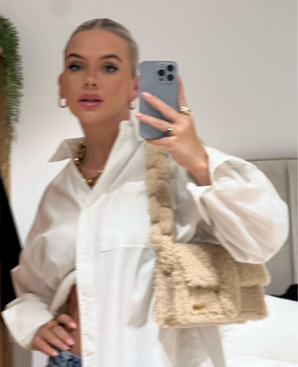 Oversized white shirt, jacquemus, Marc jacobs, faux shearling bag, fluffy bag

#LTKSeasonal #LTKstyletip #LTKeurope