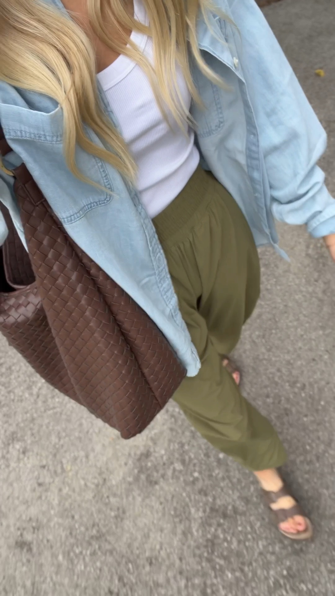 Early fall outfit inspo! What I’m wearing today for school drop off and errands! Loveee this chambray button down- covers the bum!! And this ribbed tank is my go-to! These active barrel pants are insane and restocked! And I’ve been carrying this Walmart woven bag everywhere! Looks like Bottega! @Walmart  @Target  @Aerie

#LTKootd #LTKWorkwear #LTKActive