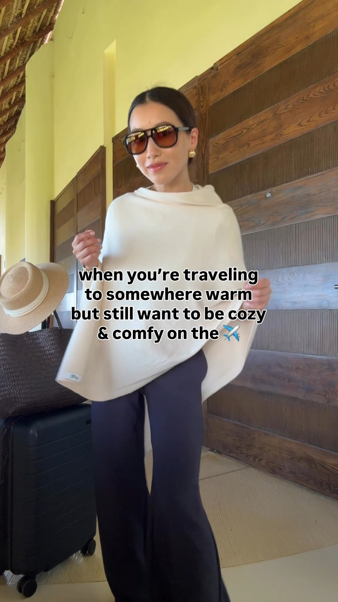 Travel outfit with convertible poncho wrap 

• Aritzia trousers 2XS short, these are amazing! Drapey fabric, stretch waist, wrinkle resistant. I also have regular sizing and hemmed them 

• Amazon poncho sweater scarf wrap

• lululemon cropped t-shirt size xxxs (could also do XXS) nice medium-weight breathable cotton, softly structured and perfect petite friendly length

• Dolce Vita jelly flats size 5, size down if you're a half size

• Madewell woven leather tote - My favorite work / mom / travel bag that fits my laptop and much more

• Madewell aviator sunglasses

• Amazon packable sunhat with an adjustable inner fit. I’ve owned this for years 

• Away the bigger flex carry-on suitcase, lightweight, roomy size and durable. I've traveled a lot with this.

Petite friendly travel outfit, family vacation, spring break, easy mom outfit


#LTKTravel #LTKPetite #LTKootd