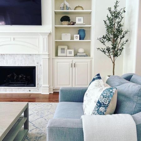 Loved styling this coastal transitional #livingroom by mixing some of the client’s sentimental pieces with new & fresh decor! Next up, we’ll be sharing two fun renovations in this gorgeous home - so stay tuned this week! #FlintshirePlaceWSH
#WoodlandsStyleHouse 

#LTKunder50 #LTKhome #LTKstyletip