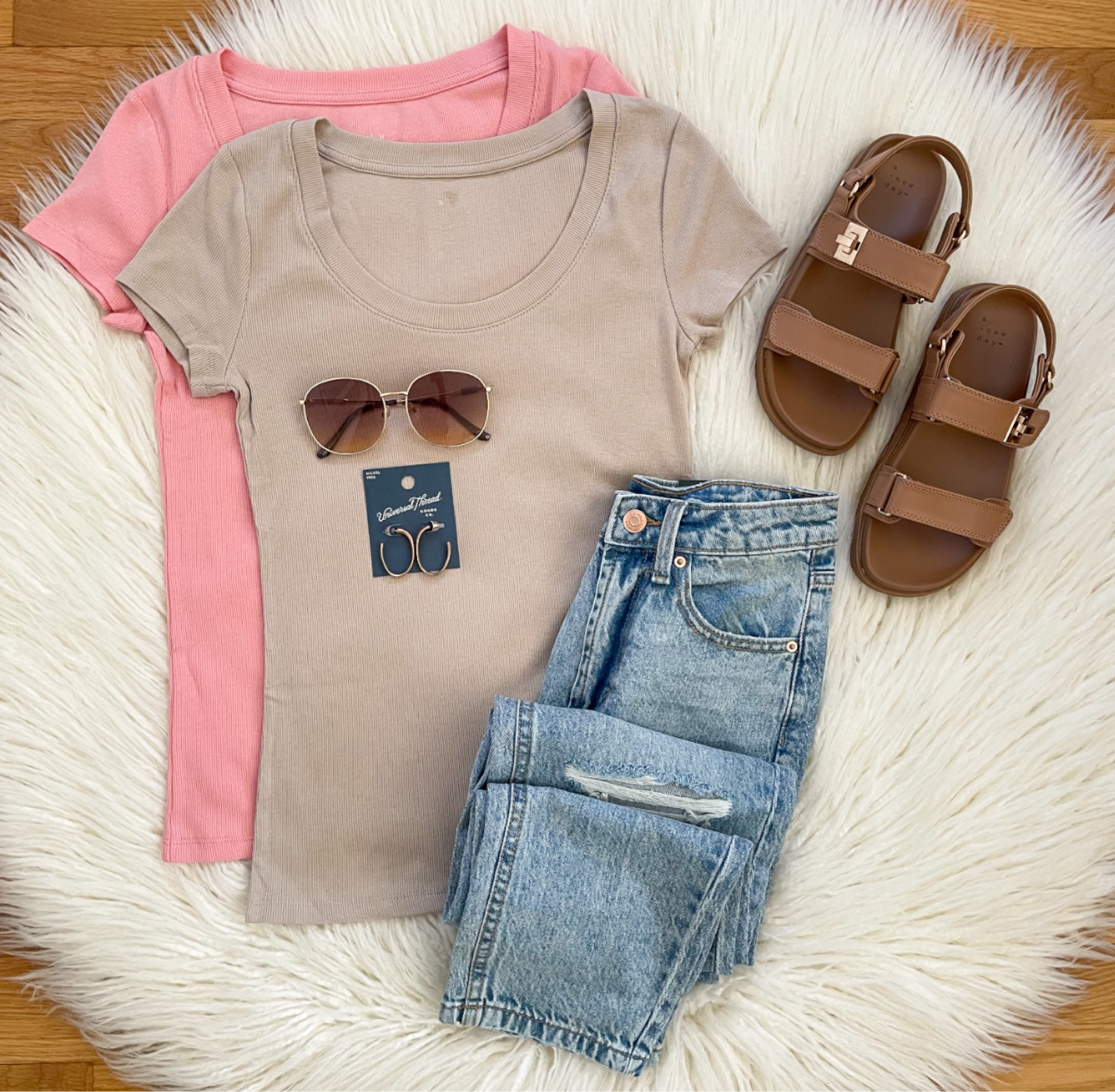 Happy St. Patrick’s Day!  A new round of sales start today at Target!  20% off Tees, Tanks, Shorts & Dresses!  I’m obsessed with these ribbed tees!  Love the fit, the ribbed fabric & neckline and they are on sale for $6.40!  Styled them with the Wild Fable Jeans & sandals!  Everything here is linked for you. Have a great day! 🍀

#LTKsalealert #LTKstyletip #LTKfindsunder50