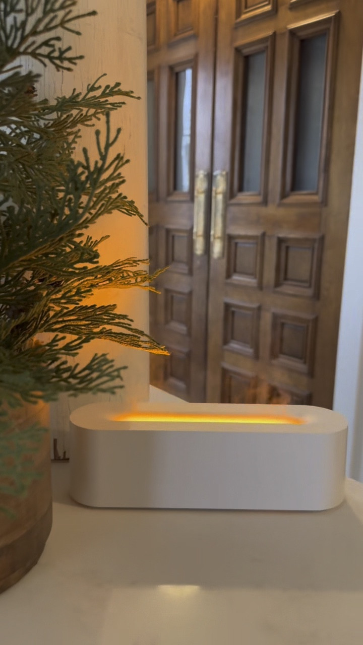 Gift Idea: not only can you receive this Flame Essential Oil Diffuser from Amazon as soon as tomorrow but it is also 50% off right now! It comes in white and black. It has a lovely warm glow that when mixed with the steam of the diffuser gives the appearance of a flame. 

#LTKGiftGuide #LTKWatchNow #LTKHome