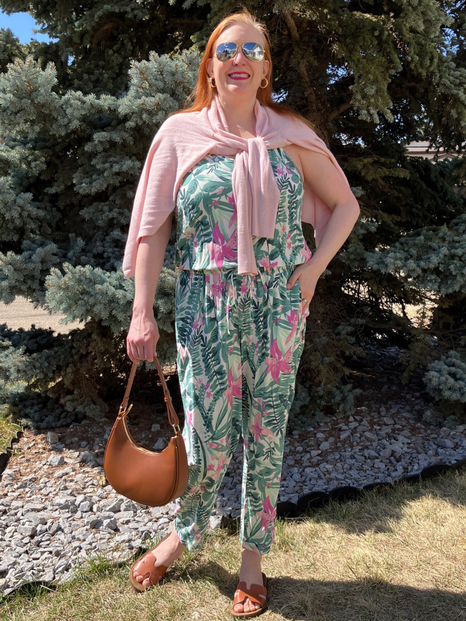 Time for some jungle love - at the very least some jungle print! I love the ease of wearing a jumpsuit. It makes it super easy to get dressed. Because of the busy pattern, I went for a solid cardigan to be tied around my shoulders and neutral shoes and a bag. It’s an older jumpsuit so I’ll try to find something similar for LTK if you’re interested in creating this look. Canadians click on the first links to shop, and Americans click on the second links to shop. If there’s only one link then you can shop it in your own country. And remember, trendy doesn’t have to be expensive! Bye!

#LTKcanada #LTKover50style #LTKmidsize