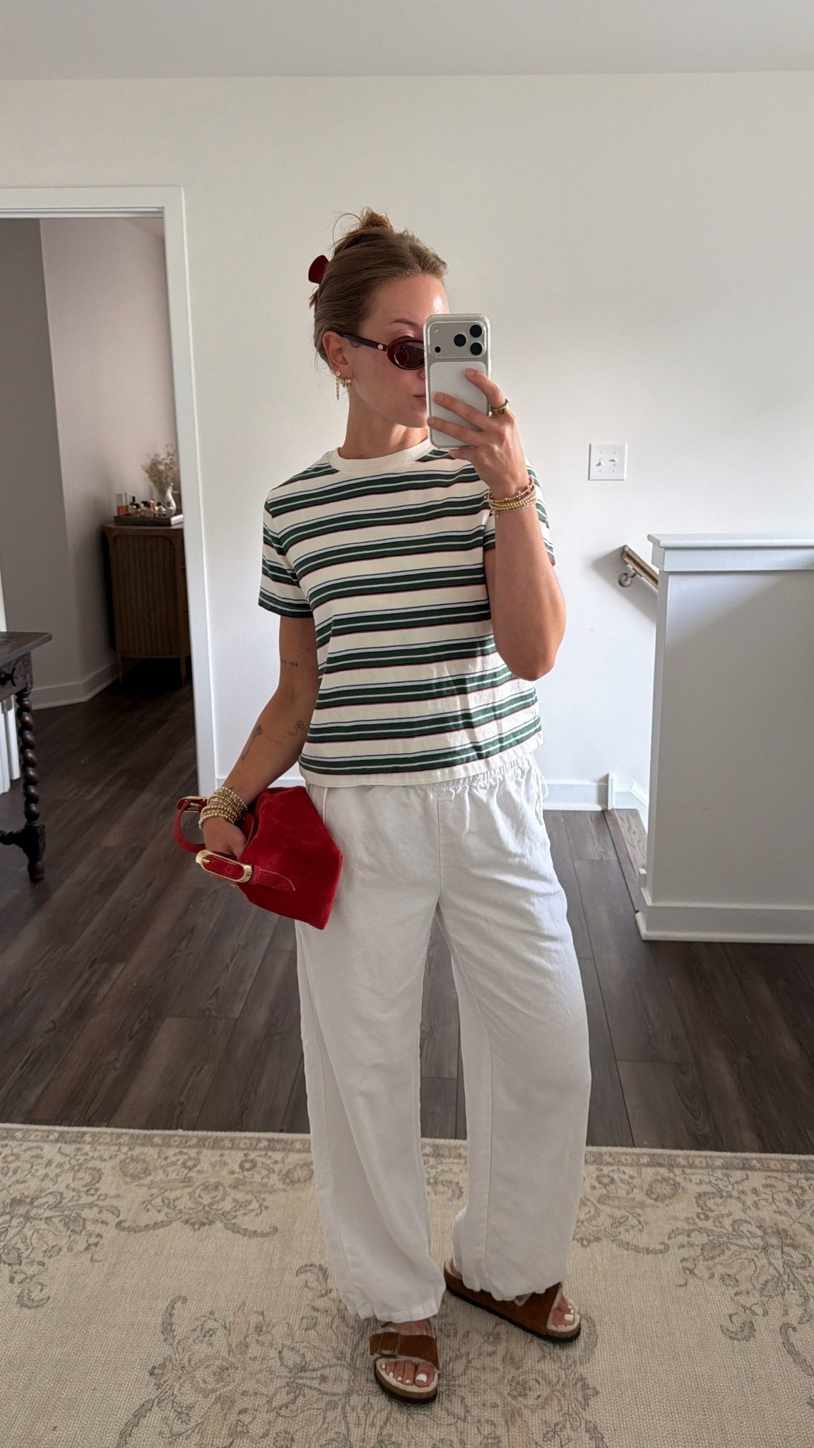 9/5/26 Casual Errands Outfit + Pops of Red ❤️

An easy errands outfit with a few pops of red to make the basics feel a little more fun ❤️ Wearing my Aritzia white linen pants + striped tee with my shearling-lined Birkenstock sandals, red J.Crew bag, Amazon claw clip + everyday Amazon earrings.

Sunglasses are from Crap Eyewear for reference. Simple, comfy + an easy outfit formula for these in-between September days. Everything I can link is linked here ✨

#LTKootd #LTKdayinmylife #LTKgrwm