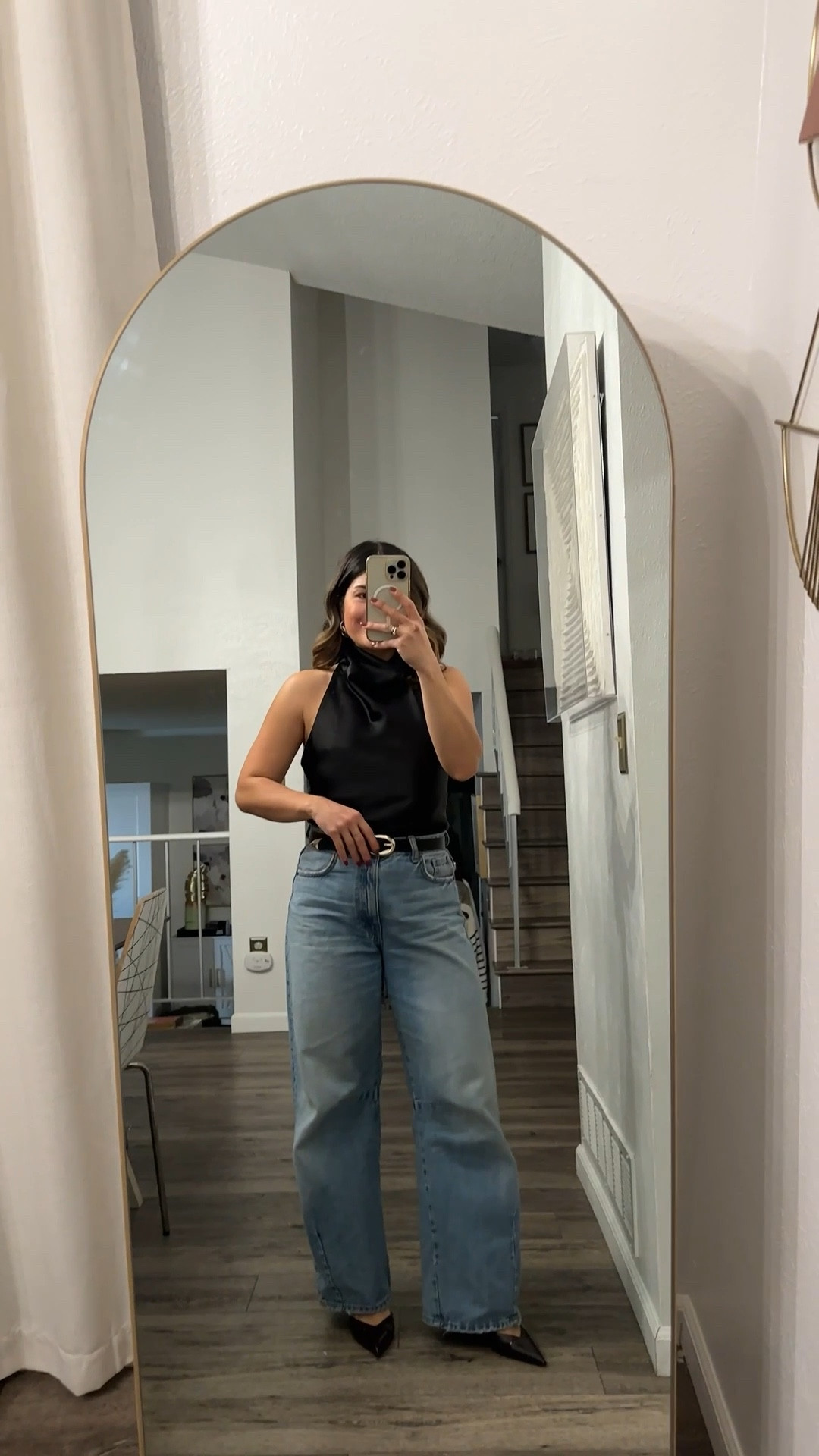 This black top is so chic! I love the back too! It almost feels like an open back top and it’s truly perfect for the holidays! Under $40! 
My Jeans are Zara too. They are sold out but I’m linking similar ones! 
Top size xs
Jeans size 25

#LTKShoeCrush #LTKHoliday #LTKFindsUnder50