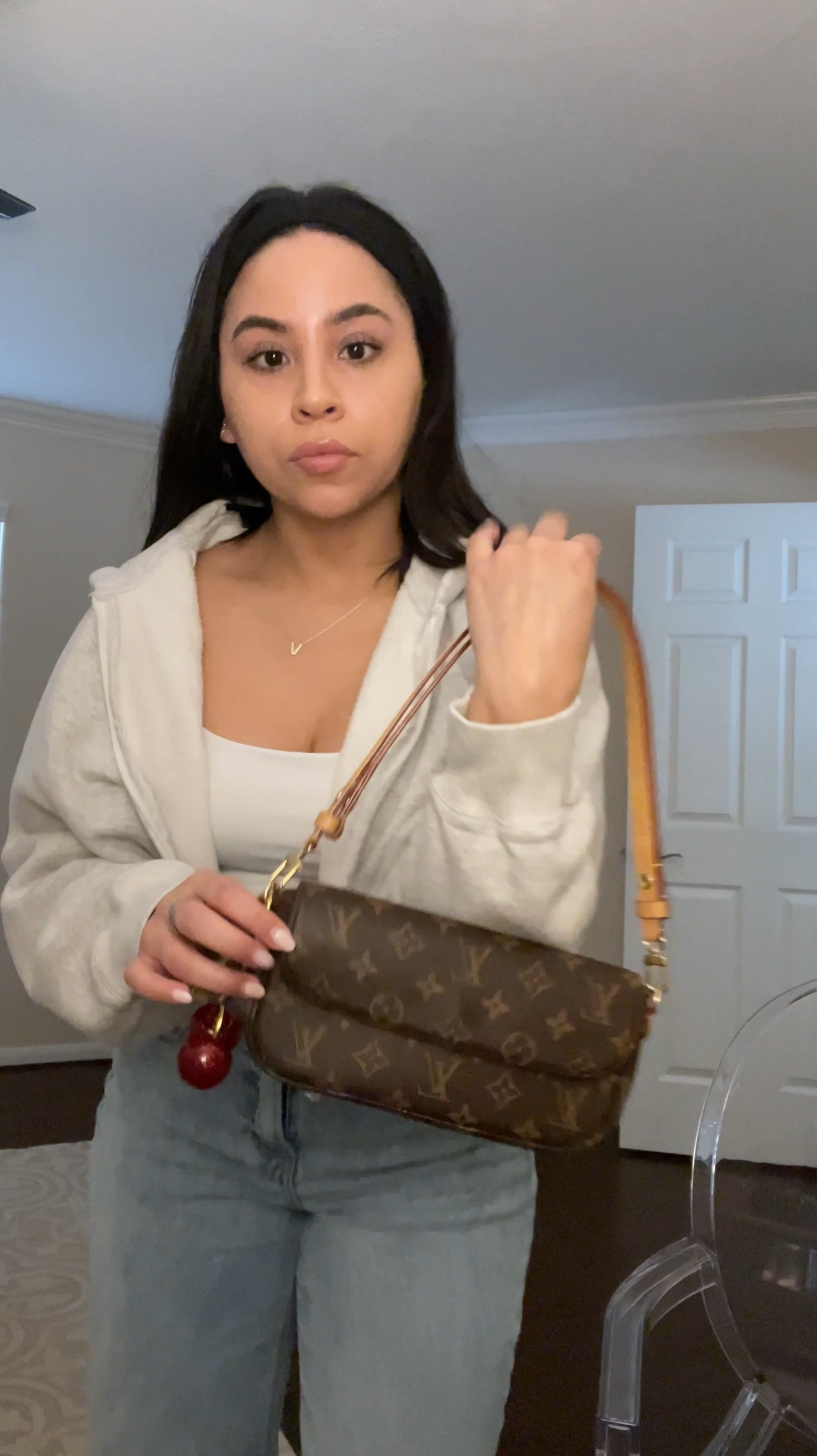 White tank: small 
Grey zip hoodie: small 
Light wash baggy jeans: 2 short 
Grey new balance sneakers: 4.5 men 
Black wrap headband 
Sol de Janeiro 69
Louis Vuitton ivy wallet in chain 
Cherry bag charms 

#LTKFindsUnder100 #LTKPetite #LTKStyleTip