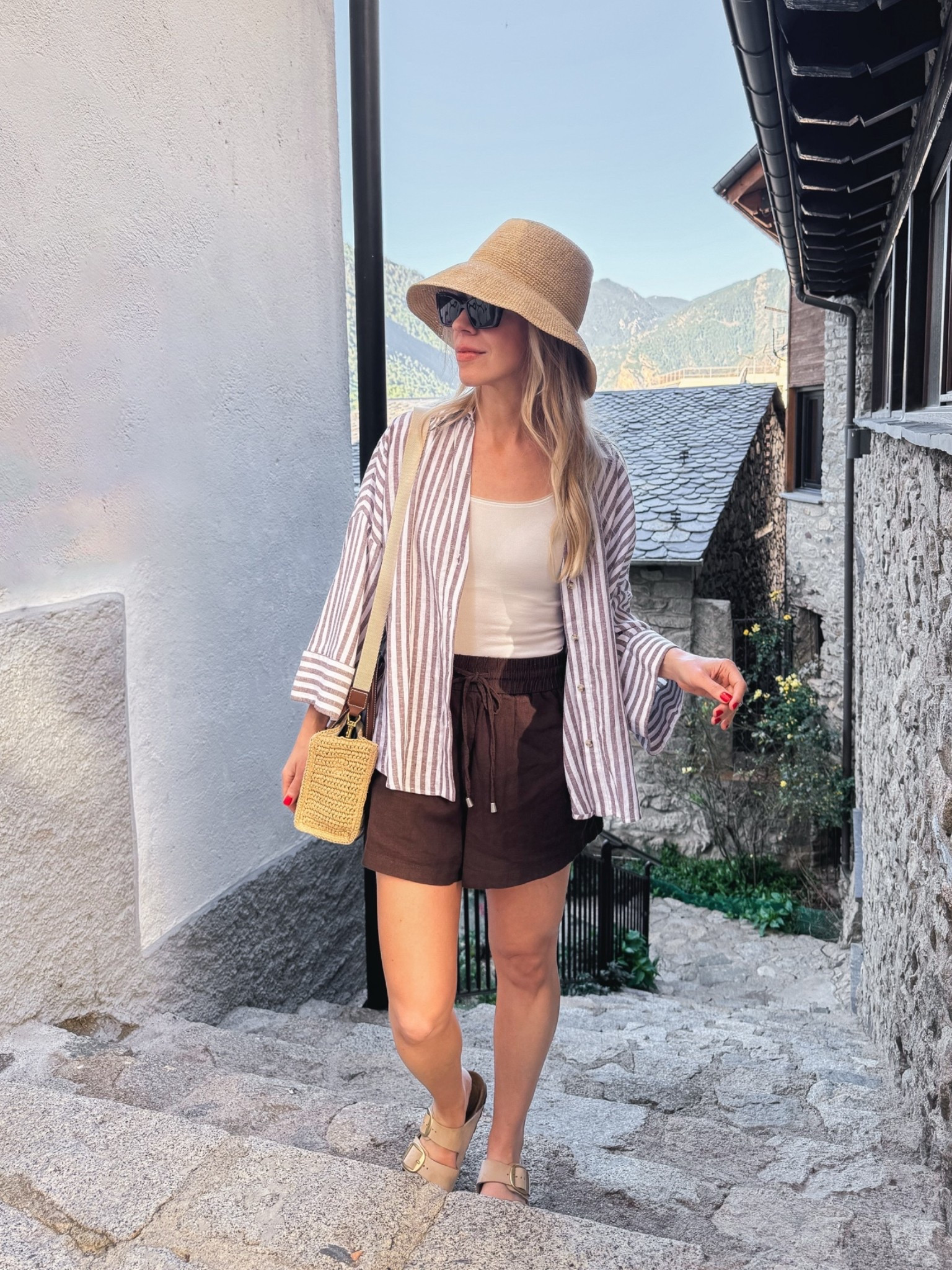 European summer vacation, linen shirt, @Janessa Leone straw bucket hat, casual summer outfit

#LTKTravel #LTKSaleAlert #LTKSeasonal